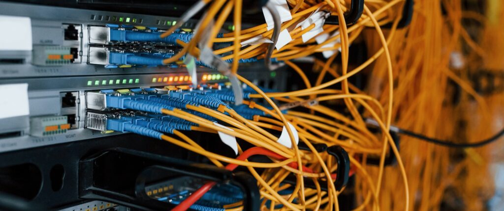 Close up view of internet equipment and cables in the server room